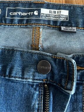 Carhartt Slim Fit Men's Denim Jeans in Blue with Brown Stitching